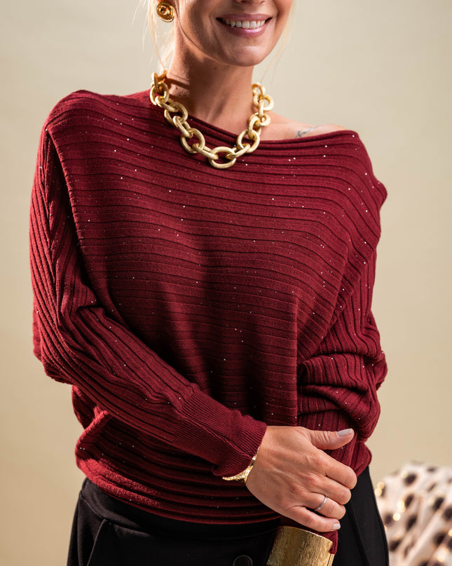 Rdeč pulover z bleščicami in črtami