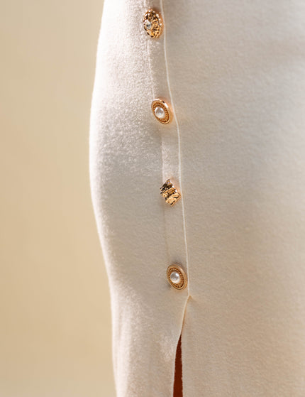 Belo midi pleteno krilo z zlatimi gumbi