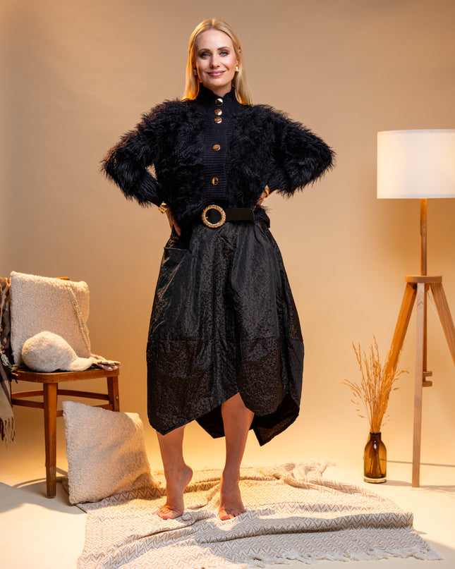 Črno krilo z živalskim vzorcem