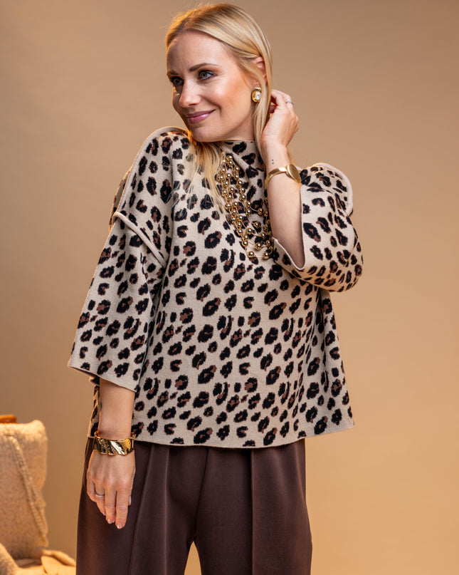 Bež pulover z živalskim vzorcem