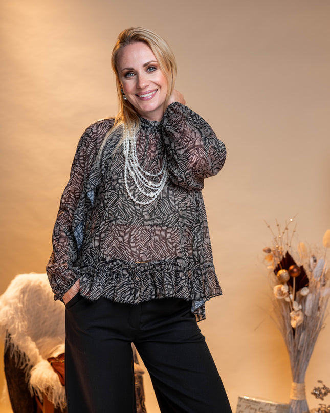 Črna široka bluza z vzorcem