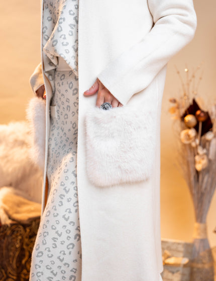 Bela dolga jopa s krznenimi žepi