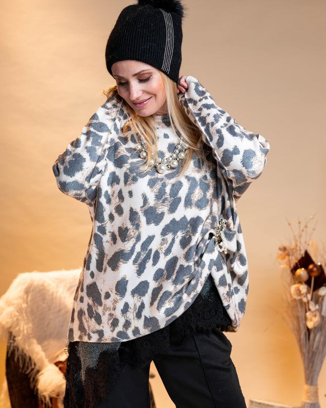 Črna elegantna kapa s cofom