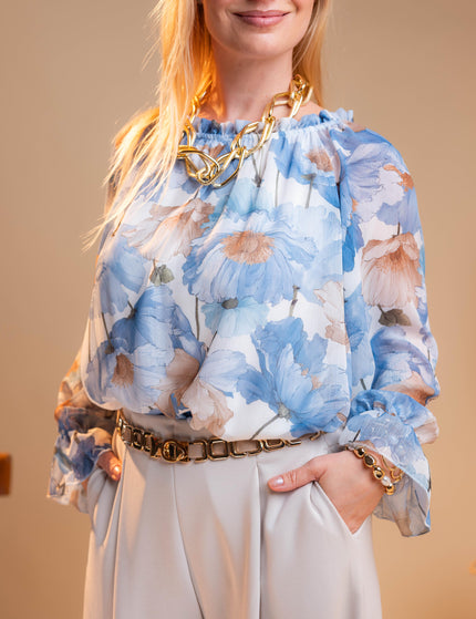 Modra bluza s cvetličnim vzorcem