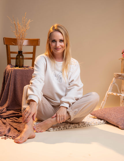 Bombažne hlače v bež barvi