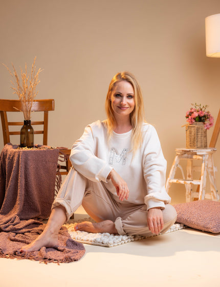 Bombažne hlače v bež barvi